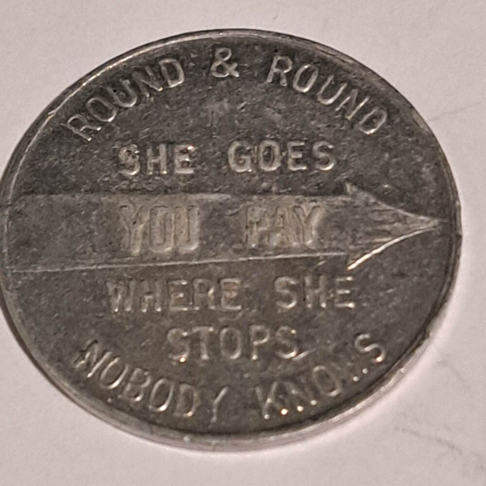 round and round she goes where she stops nobody knows Canadian spinner token